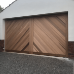 Tilt Door Clad With Cedar In Herringbone Style